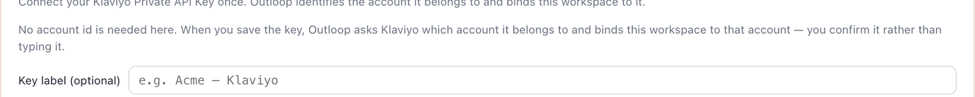 Outloop explaining that no account id is needed because it asks Klaviyo which account the key belongs to and binds the workspace to that account, above an optional key label field.